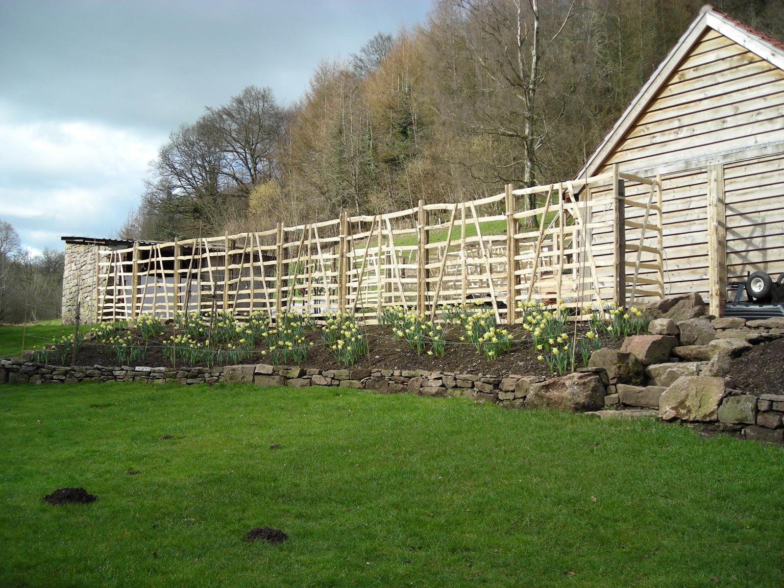 wooden boundary fences. Wooden fencing by Wiltshire fencer.