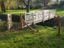 Oak and chestnut bridge with gate