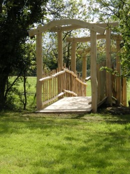 Oak bridge with chestnut paling sides