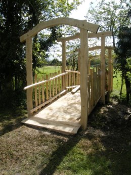 Oak bridge with chestnut paling sides