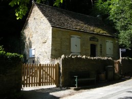 Planed oak double picket entrance gates at Castle Coombe Museum